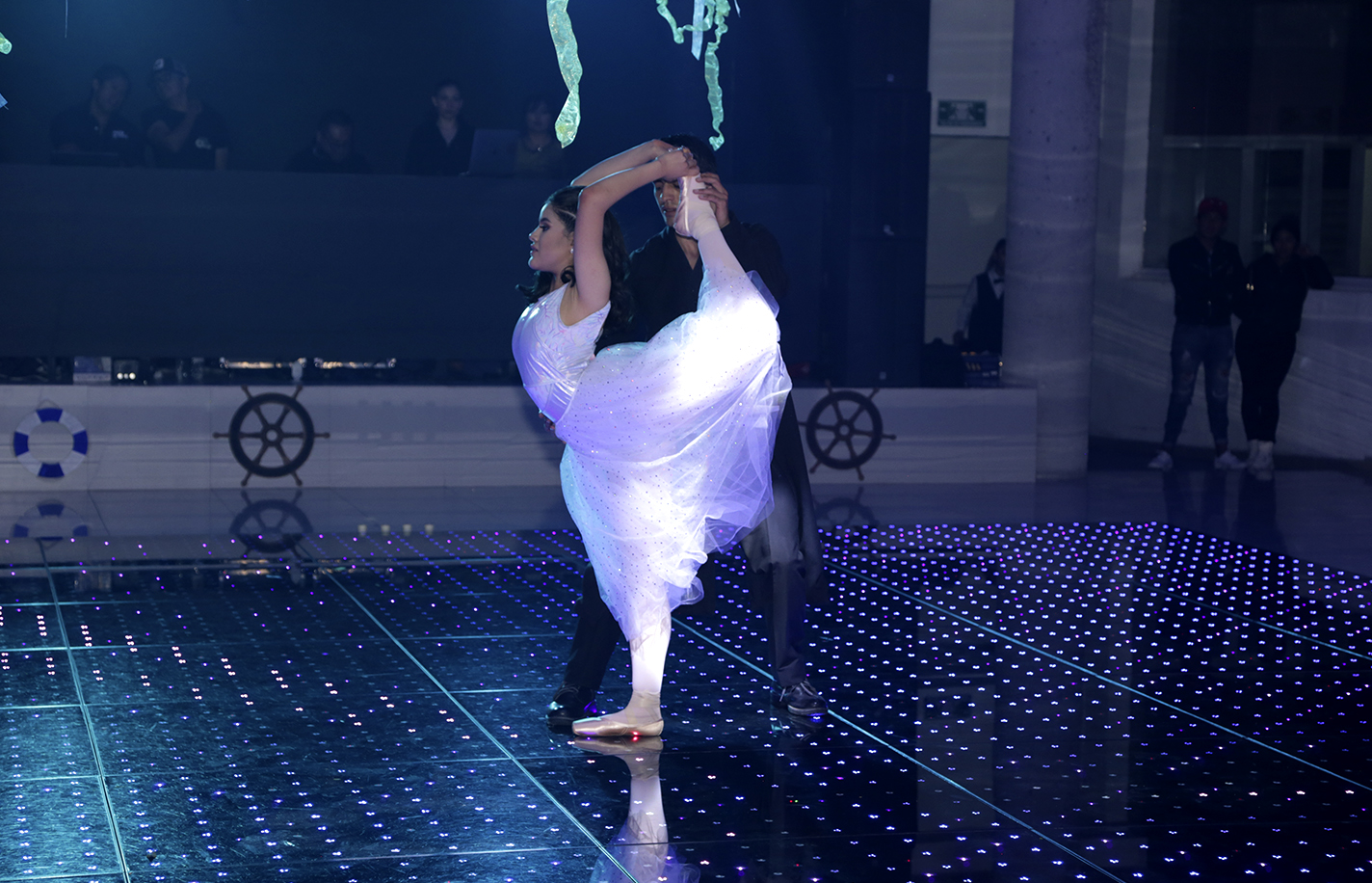Ballerina posing in a party